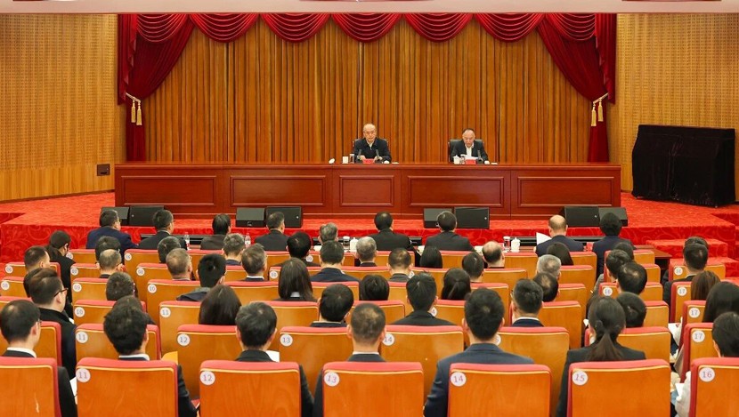 张军同志应邀到中央港澳办作讲座